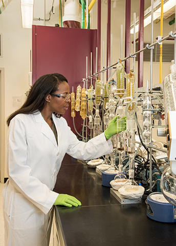 NIST research chemist Jeanita Pritchett extracts nicotine and tobacco-specific compounds from a candidate Standard Reference Material (SRM)