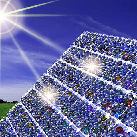 Illustration of sunlight shining on solar panel covered with nanometer-scale beads.