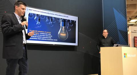 Kevin Stine and Mark Simos presenting at the Microsoft booth