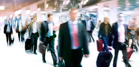 Blurry image of people in airport