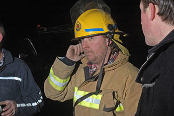 firefighter on a phone