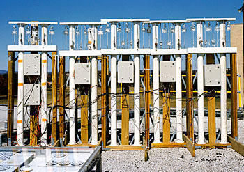 Mounted on the roof of a building on NIST’s Gaithersburg, Md., campus, this NIST-developed device is designed to induce temperature-caused strains on sealant specimens while monitoring loads and displacements. 