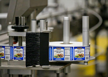 photo of roll of labels being printed in factory