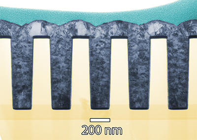 Transmission electron microscopy image of a thin cross section of 160 nanometer trenches shows deposited nickel completely filling the features without voids.