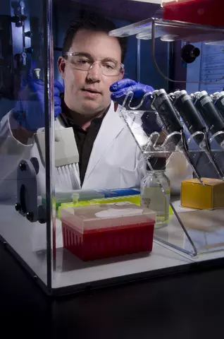 A man with a pipette