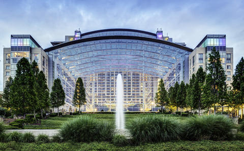 Gaylord National Harbor Hotel photo showing outside of hotel with water fountain.