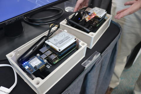 Photo of a table at the Stakeholder Meeting that hosts an award recipient demo technology
