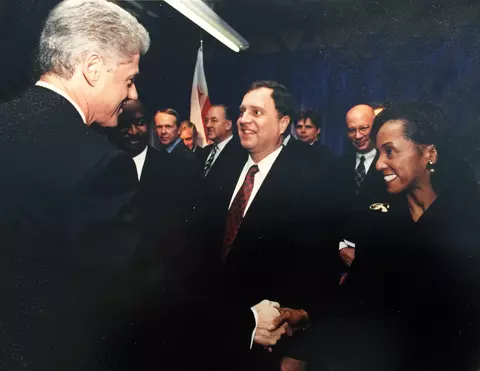 Photo of Jacqueline Calhoun meeting President Clinton at the Baldrige Award Ceremony.