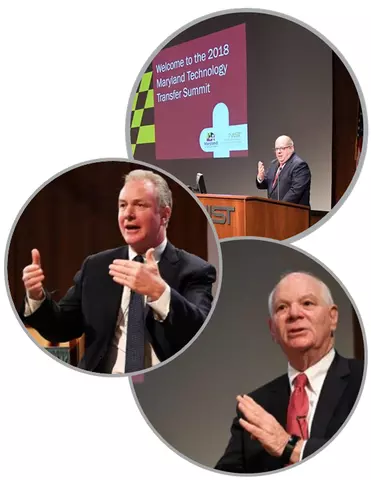 Image with 3 men speaking at conference