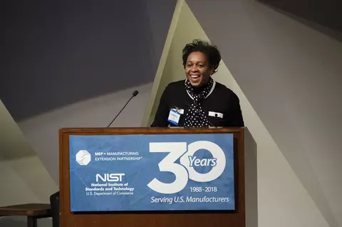 NIST MEP Director Carroll Thomas speaking at the 30th anniversary event