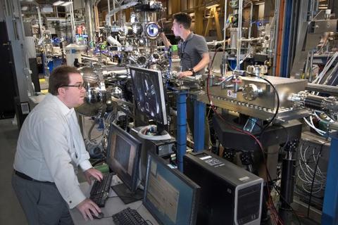 Instrument scientists Conan Weiland (left) and Nick Quackenbush (right) at the Hard X-ray Photoelectron Spectrometer (HAXPES).