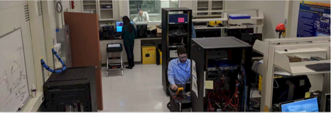 Researchers making measurements in the NIST Smart Grid Testbed