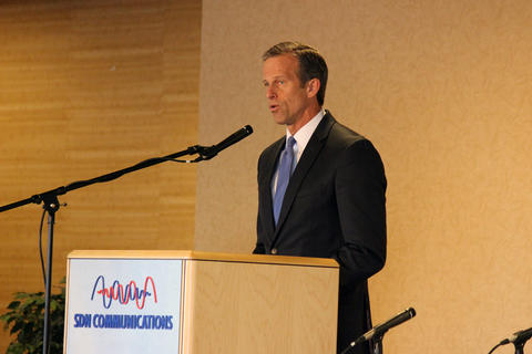 Man stands at a podium