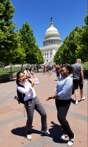 An image of 2019 Summer Undergraduate Research Fellowship (SURF) students Sue Lee and Samantha Gibson infront of the capital building