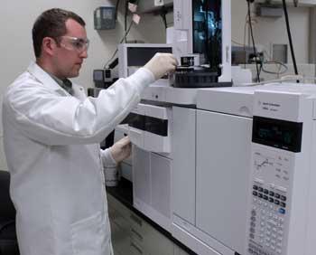 Elijah Petersen with Mass Spectrometer