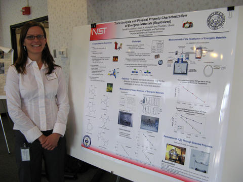 Tara standing in front of scientific poster