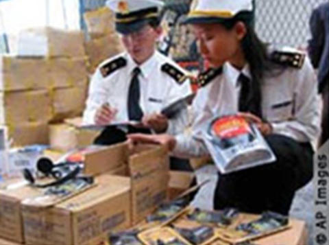 Image of 2 security officers inspecting packages