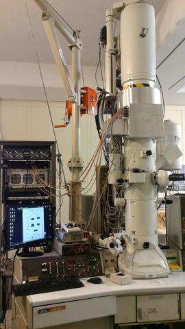 Picture of transmission electron miroscope and control panel.