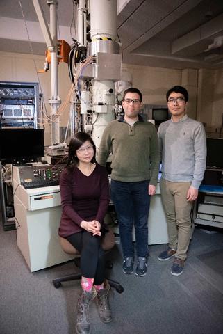 Three NIST scientist in front of transmission electron microscope