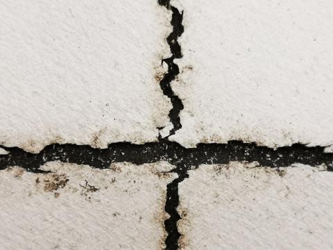 Backsheet cracks Two intersecting cracks on a solar panel backsheet.