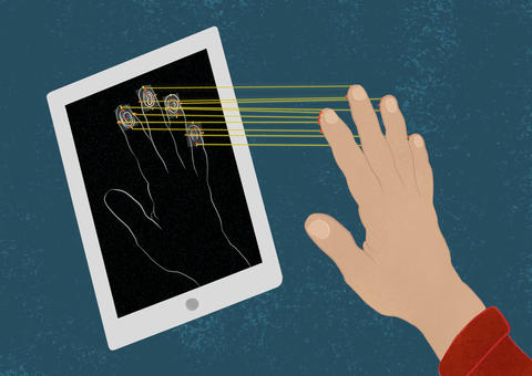 A mobile device scans the fingerprints of a hand held close to the screen. 