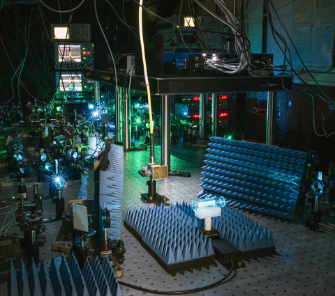 Scientific equipment in a darkened lab.