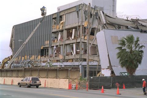 Photo taken after the Northridge earthquake highlighting the damage to buildings and infrastructure.