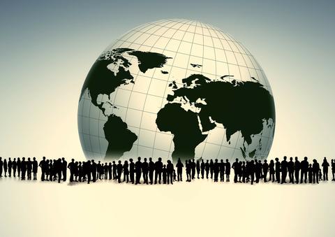 Shadows of all types of people, all genders and ages, standing from left to right in the middle of the frame. In the background, a globe showing, in black, the continents of North and South America, Africa, Europe, and Asia. Shadows of all types of people, all genders and ages, standing from left to right in the middle of the frame. In the background, a globe showing, in black, the continents of North and South America, Africa, Europe, and Asia.