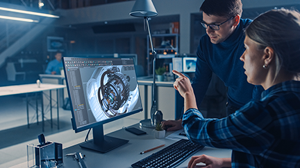 Engineer Working on Desktop Computer, Screen Showing CAD Software with Engine 3D Model, Her Male Project Manager Explains Job Specifics. Industrial Design Engineering Facility Office stock photo