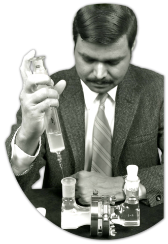 Photo of Dr. Patel preparing diffusion cell in study of tooth decay, 1973.