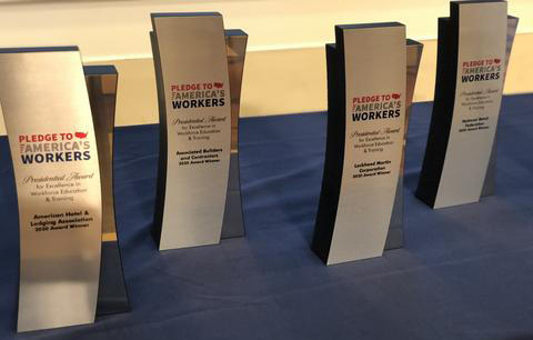 Trophies for the inaugural Pledge to America’s Workers Presidential Award.