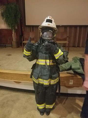 woman in firefighter gear