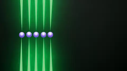 Row of five purple spheres, each held top and bottom by tips of long green probes, on black background.
