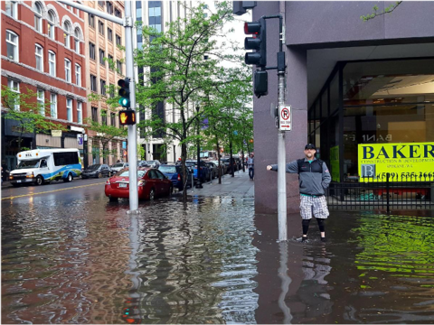 A flooding street corner 