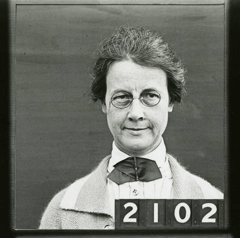woman wearing glasses and a decorative bowtie