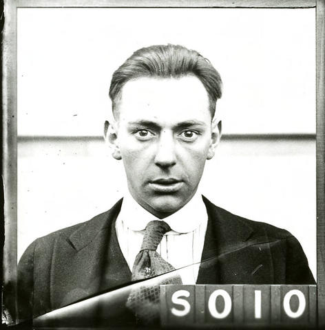 Caucasian man wearing a suit and tie