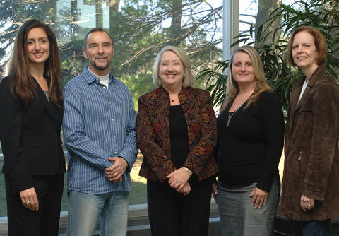 Photo of Barb Fischer and other staff winning a NIST Award for Blogrige.