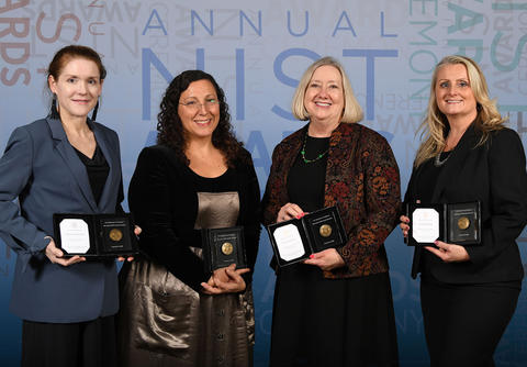 Photo of Barb Fischer and other Baldrige blog staff winning the NIST Bronze Award.