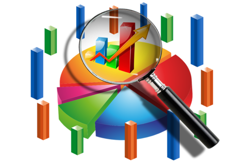 A magnifying glass hovering over a pie graph