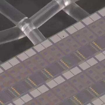A rectangular array of chips is gray with yellow squares in the corners.