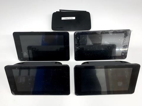 Photo of four iPADs and the Team FRITES Device