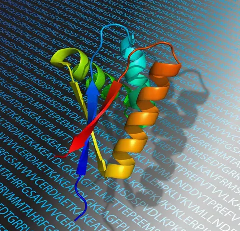 5 colored ribbons, some twisted, on top of each other. background with random letters.