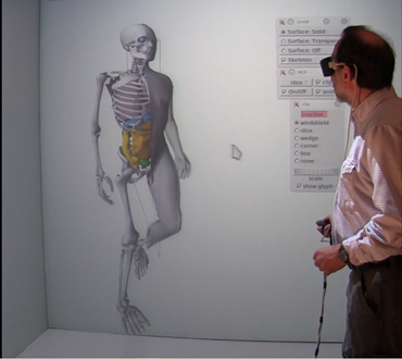 A researcher interacting with a 3D computational body model using the ITL Immersive visualization platform