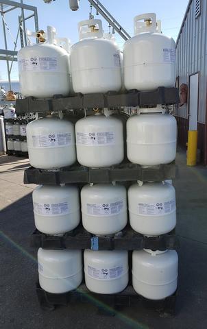 Photo of stacked 20 lb propane cyclanders