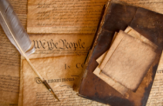 Photo of Original U.S. Constitution with a feather quill