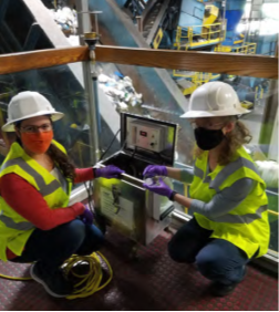 Diana Ortiz-Montalvo and Abigail Lindstrom conducting Air Sampling