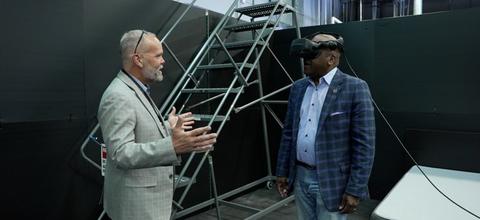 NIST PSCR Division Chief Dereck Orr giving a VR headset demonstration