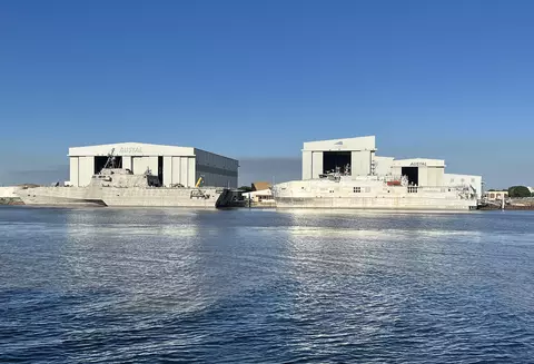 ships at a dock on the water