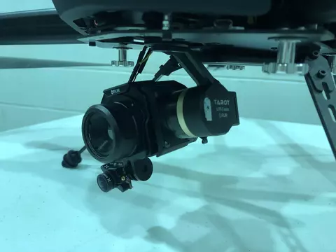 Photo of camera connected to a drone