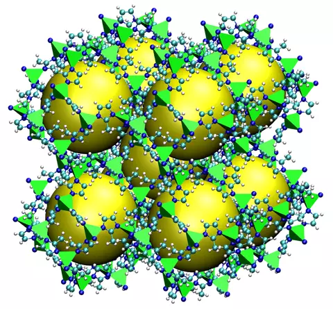 Crystal structure is shown as an open cube with nine empty spaces marked by spheres.
